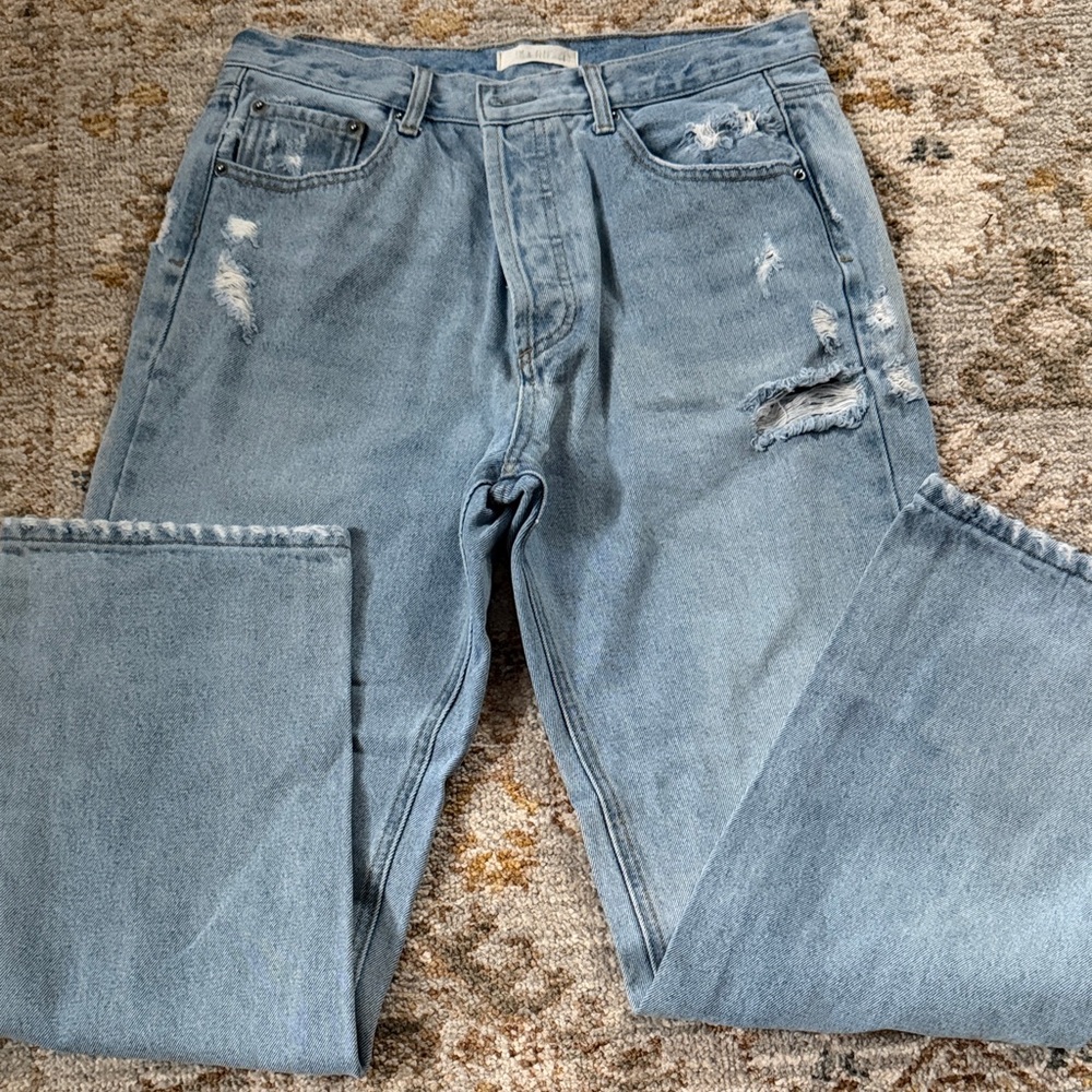 Em and Elle ripped jeans. Very gently worn